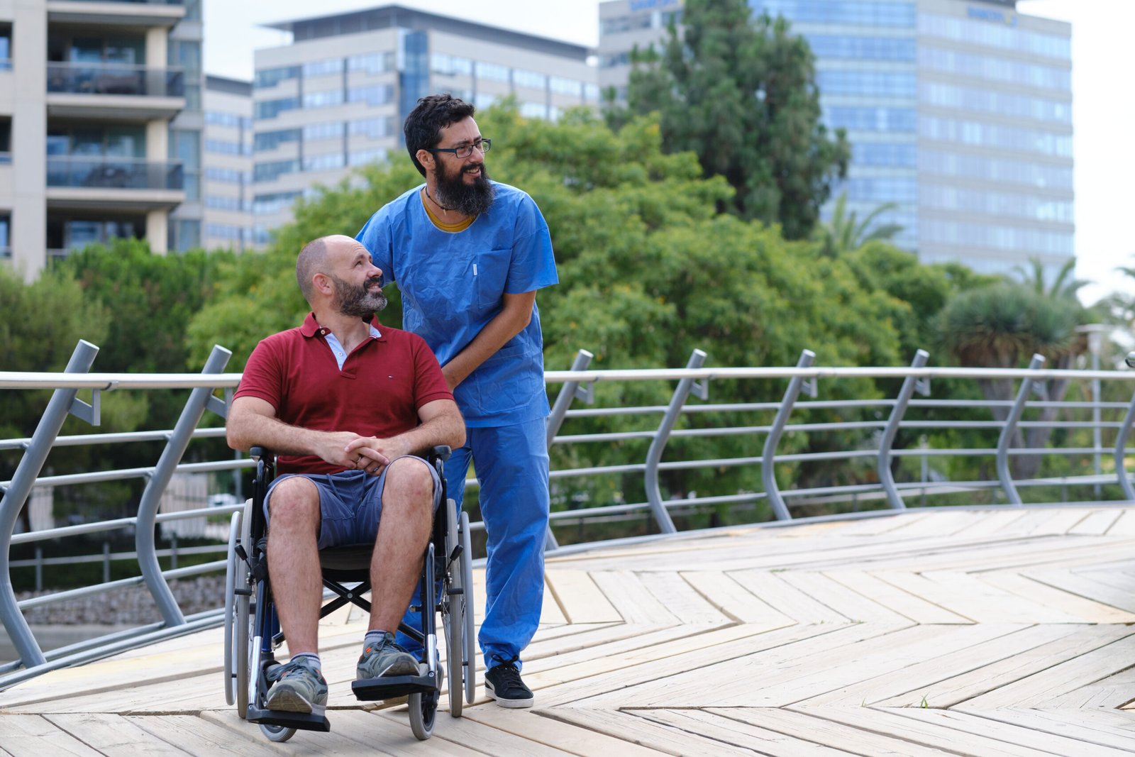 Carer Pushing Senior Man In Wheelchair People Wi 2026 01 08 07 01 12 Utc Scaled